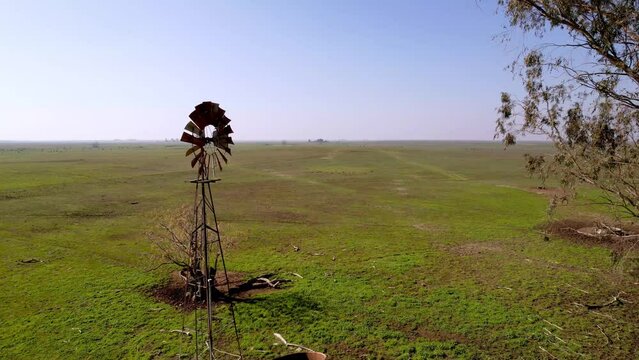 old wind vane fly by on farm outside of merced california