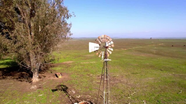 wind vane aerial orbit on old farm site in central california