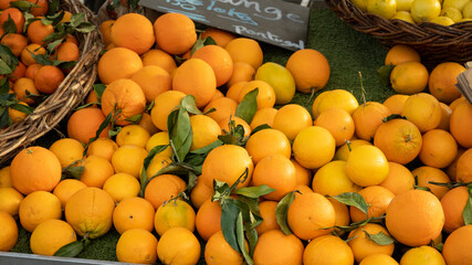 Pile of fresh oranges in a marketplace