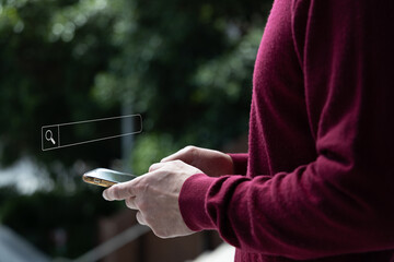 Data Search Technology Search Engine Optimisation. man's hands are using a smartphone to Searching...
