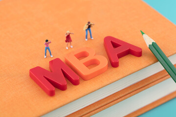Miniature scene, striving to obtain MBA degree, cheering