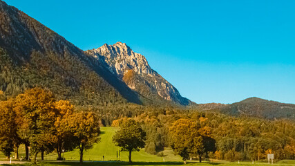 Beautiful autumn or indian summer view with the famous Hochstaufen summit in the background near Piding, Bavaria, Germany