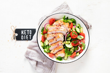 Salad with chicken meat. Fresh vegetable salad with chicken breast. Meat salad with chicken fillet and fresh vegetables on plate.