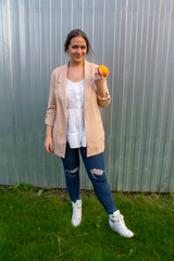 young beautiful woman in a jacket and jeans