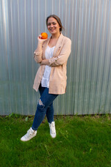 young beautiful woman in a jacket and jeans