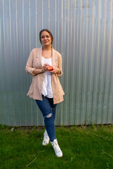 young beautiful woman in a jacket and jeans