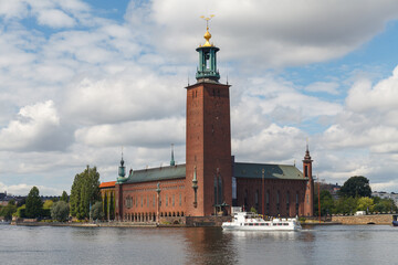 STOCKHOLM, SWEDEN - AUGUST 24, 2022: Scenic view with the City Hall on a beautiful sunny day, Stockholm, Sweden