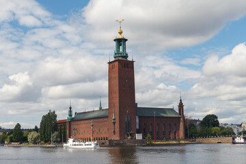 STOCKHOLM, SWEDEN - AUGUST 24, 2022: Scenic view with the City Hall on a beautiful sunny day, Stockholm, Sweden