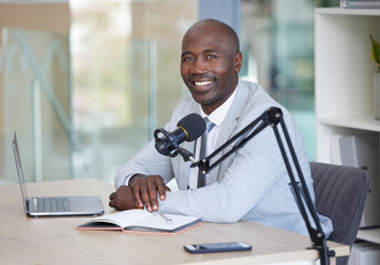 Podcast, portrait and black man with microphone, radio broadcast or content creation in office,...