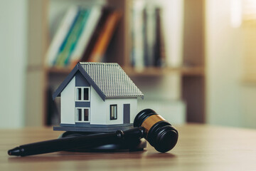 Judge auction and real estate concept.gavel justice hammer and House model. real estate law. taxes and profits to invest in real estate and home buying .concept of legal education.