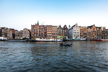 Obraz na płótnie Canvas Amsterdam Canals with bridge and dutch houses, Netherlands