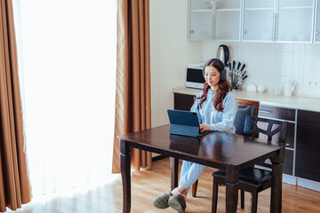 Freelance asian woman working at home