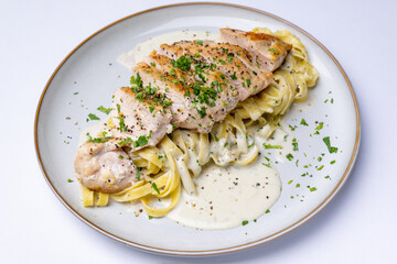 Fettuccine with chicken and cheese sauce