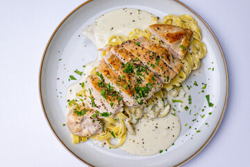 Fettuccine with chicken and cheese sauce