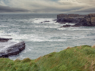 Stunning rough coast line of Ireland near Bridges of Ross, county Clare. Irish seascape. Beautiful...
