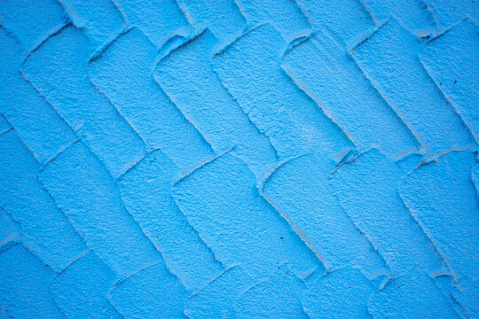 Imagen de una pared con textura color azul ideal para portadas estuco 