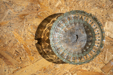 Astray on wooden table with copy space, Top view