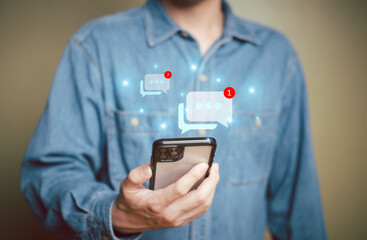 Selective focus at men hand while type on smartphone while chat and communication with friend on online social media platform. Virtual community that people can share or upload photo and content.