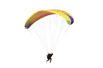 The sportsman flying on a paraglider. isolated on transparent background with clipping path. Beautiful paraglider in flight  with clipping path and alpha channel. for both printing and web pages. 