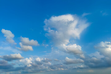Naklejka na ściany i meble Clouds floating in blue sky