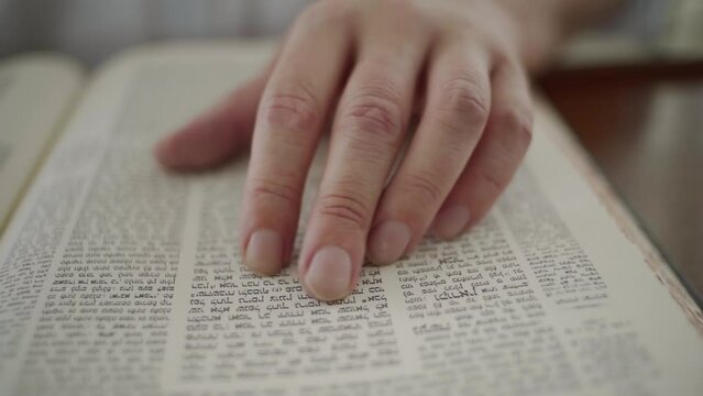 Jewish man read from the Bible torah