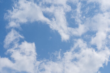 Cloudscape - Blue sky and white clouds, wide panorama.