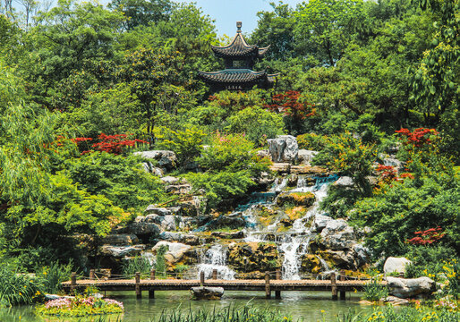 Beautiful Chinese traditional style garden in Shouxi Lake Park in summer days. Chinese characters in the picture translated as "Wind, Moon, clearness and prosperity".