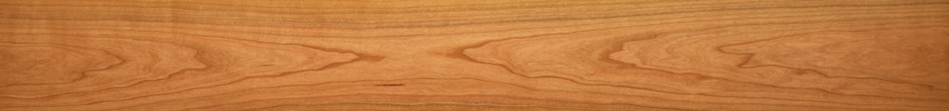 T
exture of wood. Long and wide wooden texture panoramic background. Wooden planks natural texture, cherry wood long plank texture background.	