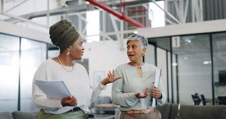 Business women, conversation and modern office for marketing strategy, planning and busy. Female...