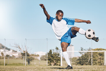 Sports, soccer and black man kick ball playing game, training and exercise on outdoor field. Fitness, workout and male football player in action, running and score goals, winning and competition - obrazy, fototapety, plakaty