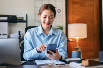 Businesswoman is checking information of new business project on