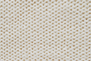 White soft garter woolen sweater surface texture as background