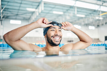 Happy, man or relax in swimming pool with cap or goggles in sports wellness, training or exercise...