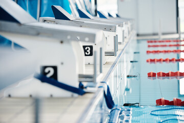 Sports, competition and podium row by swimming pool for training, exercise and workout for water...