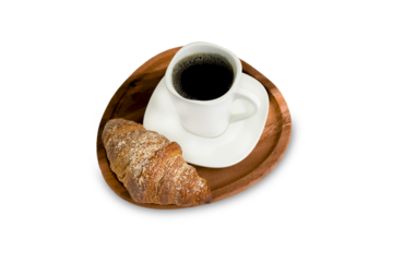 A cup of coffee with a croissant on a wooden board isolated on a white background.