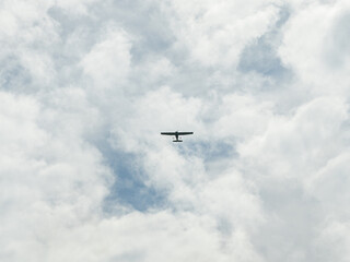 Small private propeller airplane in the sky