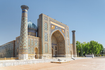Awesome facade of the Sher-Dor Madrasah at the Registan Square