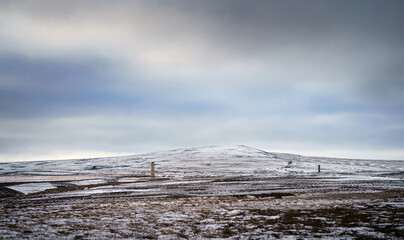 The snow covered summit of Bolt's Law above Buckshott moor in winter near Blanchland, Northumberland  in England UK.