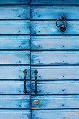 old wooden blue  door with lock