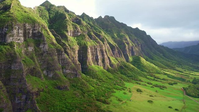 Drone Hawaii. Aerial view of Oahu windward side. Kualoa ranch, Koolau mountains valley landscape. Tropical paradise vacation travel. 