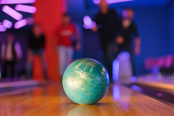 Gather friends and family for a night of laughter and friendly competition. A game of bowling bring...