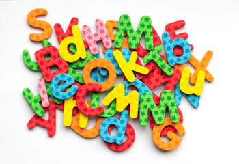 top view of colorful letter d of the alphabet for learning to write and read. colorful abc on white...