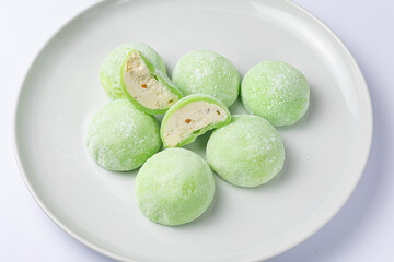 Delicious mochi on a white background, close-up. Traditional Japanese dessert
