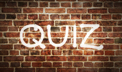 Fototapeta na wymiar Quiz spray painted on the brick wall illustration