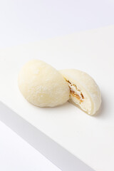 Delicious mochi on a white background, close-up. Traditional Japanese dessert
