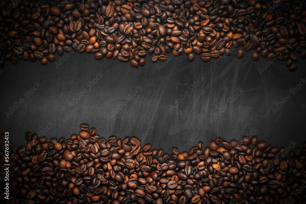 Poster large group of roasted coffee beans on an empty blackboard with copy space. horizontal composition.