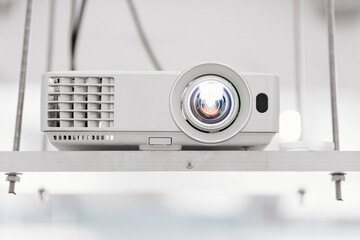 The video projector is suspended from the ceiling to show presentations