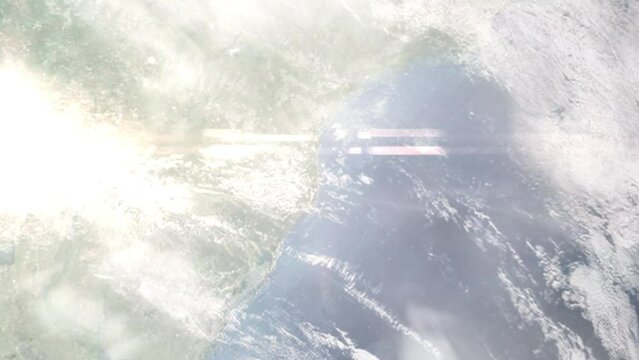 Earth zoom in from outer space to city. Zooming on Florianopolis, Santa Catarina, Brazil. The animation continues by zoom out through clouds and atmosphere into space. Images from NASA