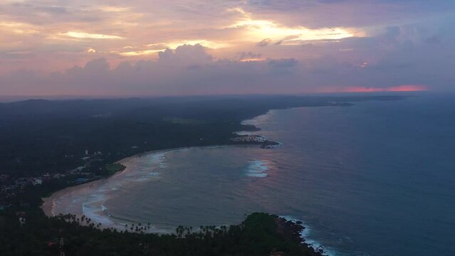 Top view of beach and the ocean during sunset. Dickwella Beach, Sri Lanka.