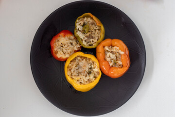 Stuffed peppers, colorful peppers stuffed with rice, top view. (Turkish name; stuffed peppers)